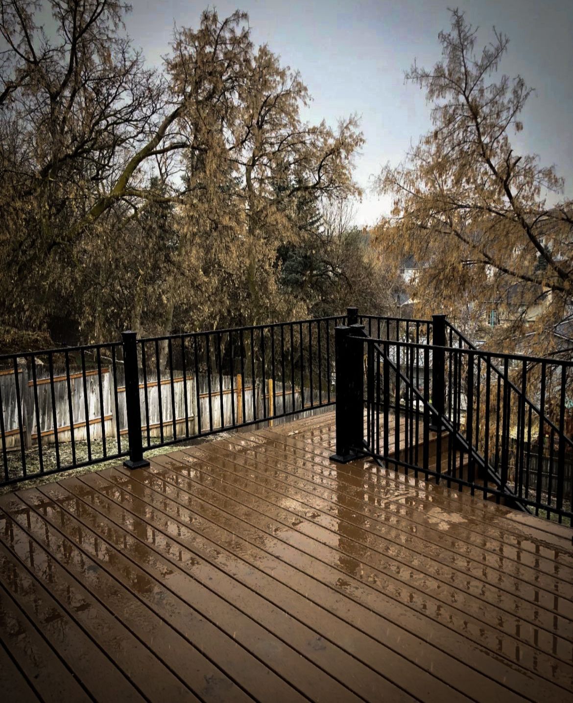 Wood deck with metal rails